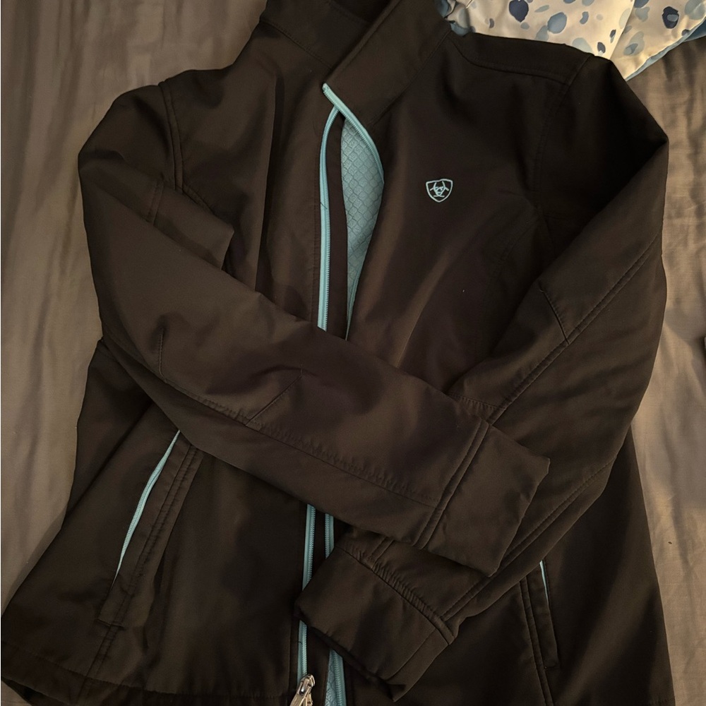 Black Jacket with Light Blue Accents